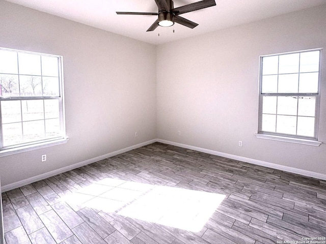 unfurnished room featuring ceiling fan and wood-type flooring