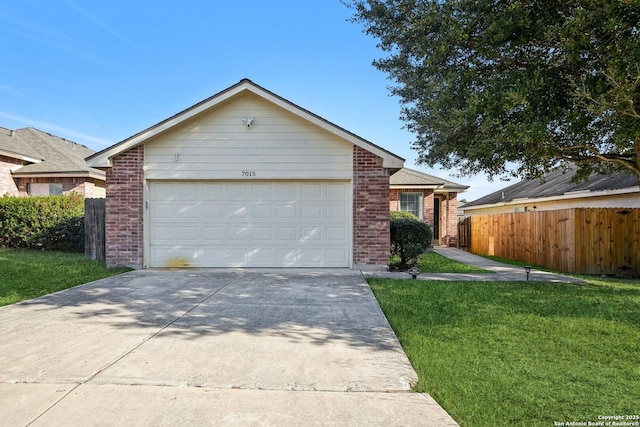 single story home with a front lawn and a garage