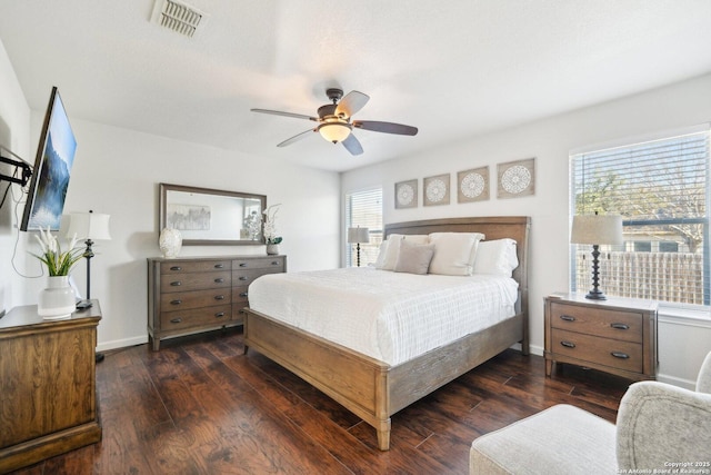 bedroom featuring ceiling fan and dark hardwood / wood-style flooring