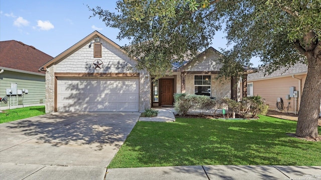 view of front of home featuring a front yard and a garage