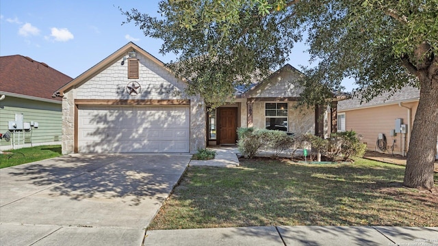 view of front of house with a garage and a front yard