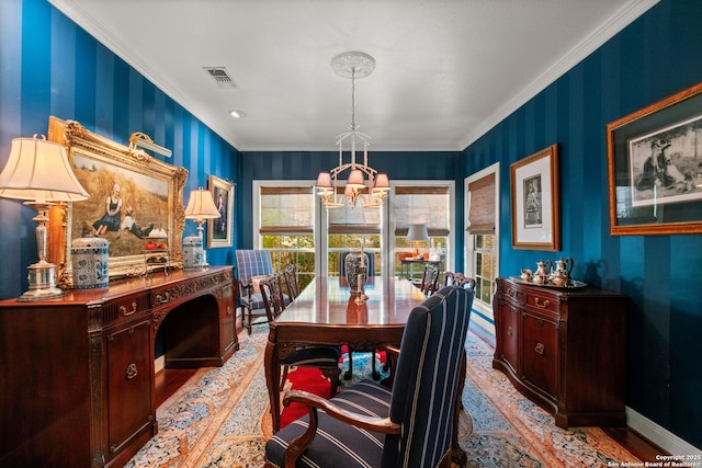 office space with a notable chandelier and ornamental molding