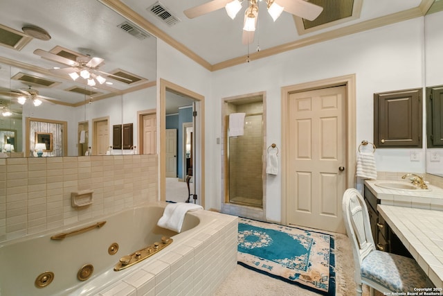 bathroom with vanity, separate shower and tub, and ornamental molding