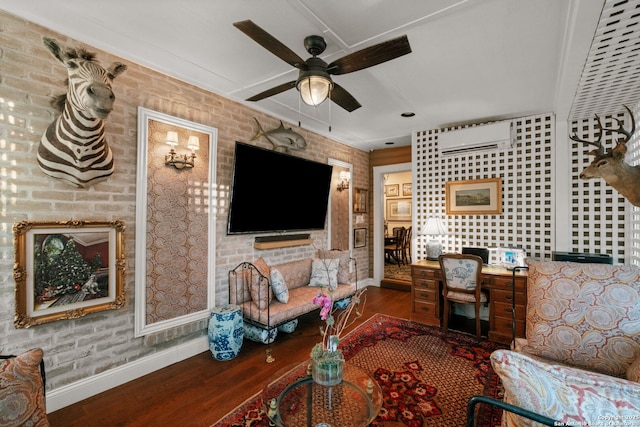 living room with wood-type flooring, an AC wall unit, and brick wall