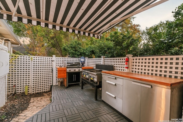 view of patio with area for grilling