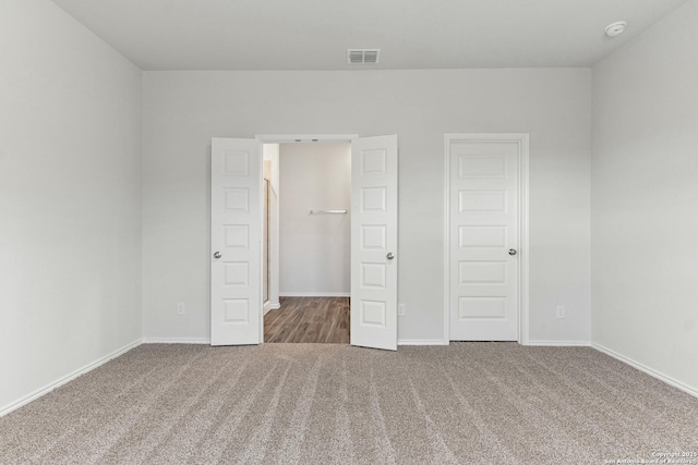 unfurnished bedroom featuring carpet flooring