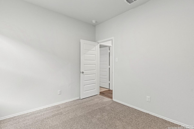 empty room featuring carpet