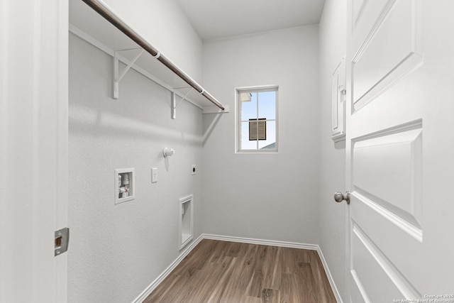 laundry room featuring electric dryer hookup, gas dryer hookup, wood-type flooring, and hookup for a washing machine