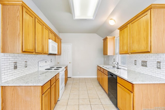 kitchen with light tile patterned floors, white appliances, light stone counters, and backsplash