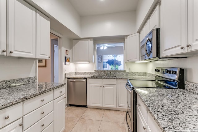 kitchen with white cabinets and stainless steel appliances