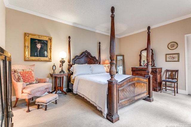 bedroom featuring carpet, a textured ceiling, and ornamental molding