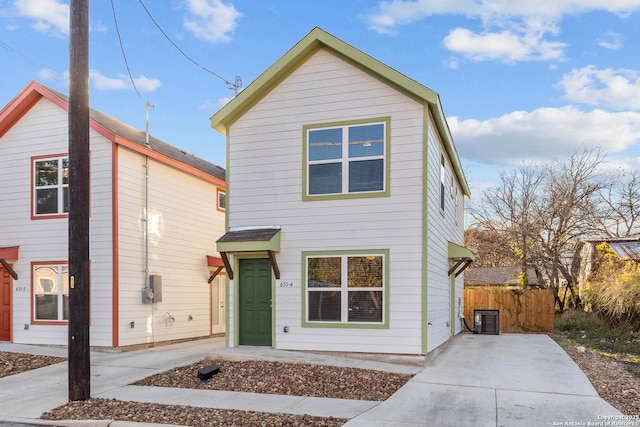 view of front property featuring central AC unit