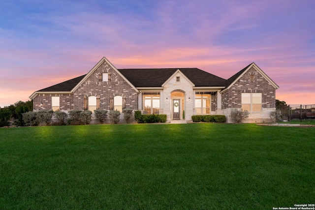 view of front facade with a lawn