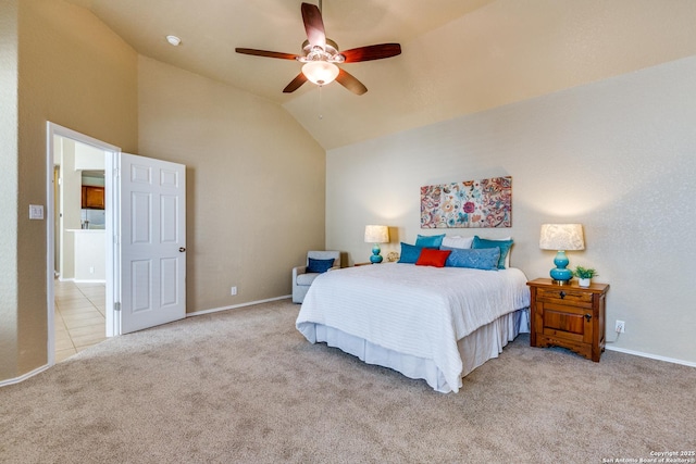 bedroom with baseboards, ceiling fan, light colored carpet, vaulted ceiling, and light tile patterned floors