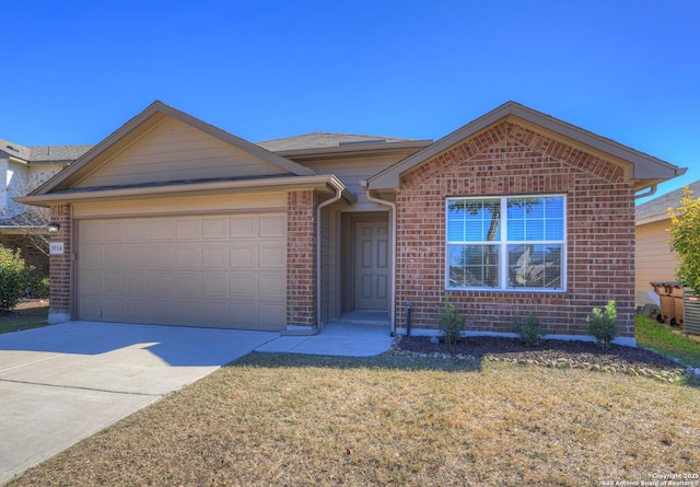 single story home with a front yard and a garage