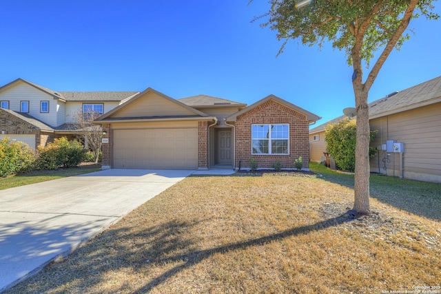 view of front of property featuring a garage and a front lawn