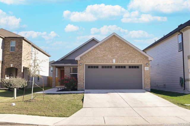 view of front of house with a front lawn and a garage