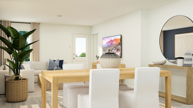 dining area with hardwood / wood-style flooring