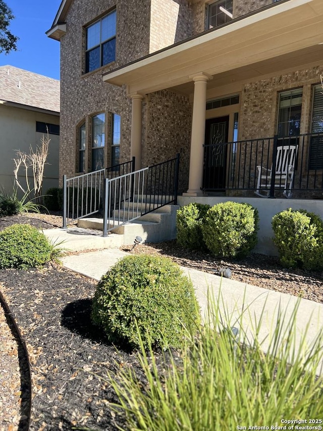 entrance to property with a porch