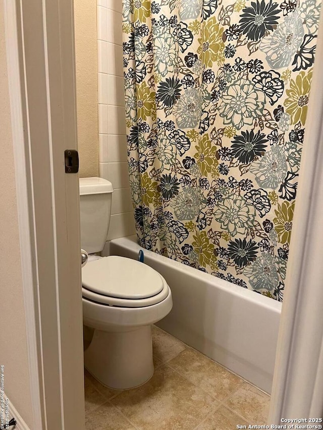 bathroom featuring toilet