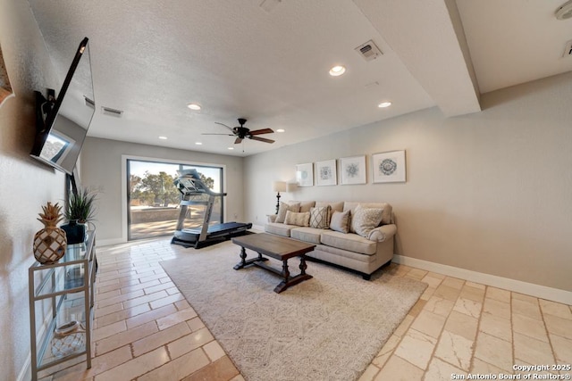 living room with ceiling fan