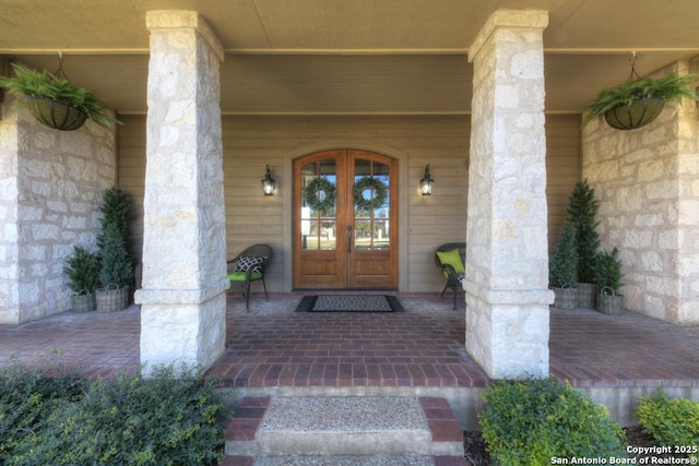 doorway to property with french doors and covered porch