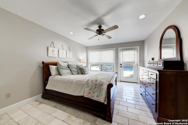 bedroom with ceiling fan and access to outside