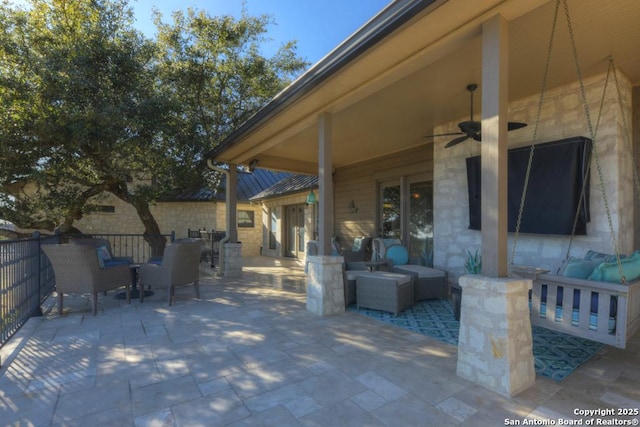 view of patio / terrace with outdoor lounge area and ceiling fan