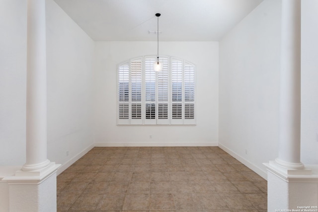 unfurnished dining area with light tile patterned flooring