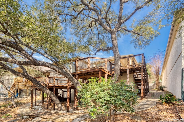 rear view of property with a deck