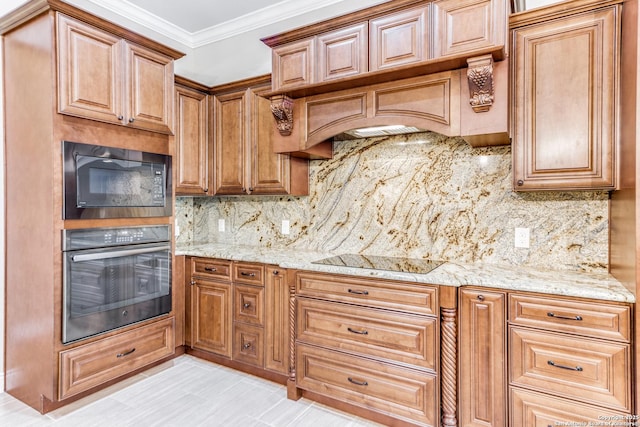 kitchen featuring light stone countertops, premium range hood, crown molding, decorative backsplash, and black appliances