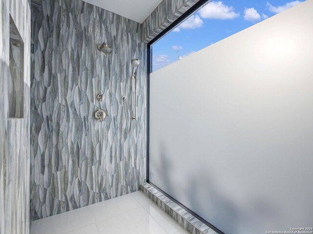 bathroom with tile patterned flooring