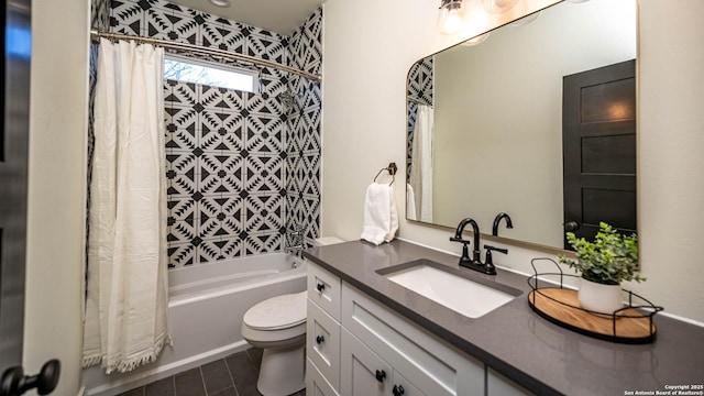 full bathroom with shower / bath combo, vanity, and toilet