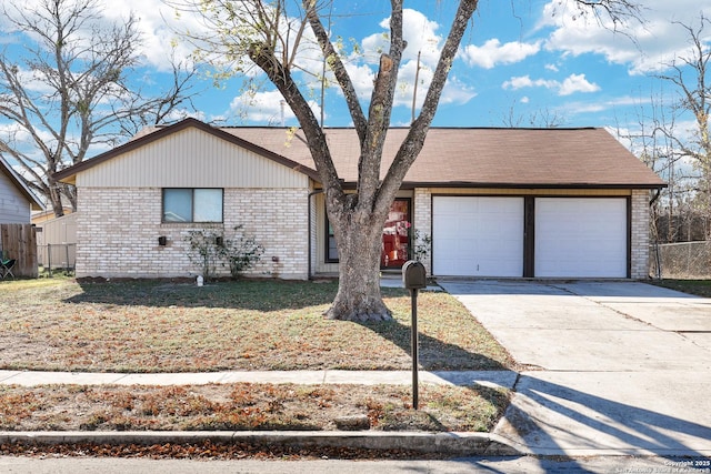 single story home with a garage