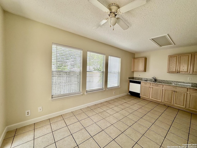 kitchen with dishwashing machine, ceiling fan, sink, light brown cabinets, and light tile patterned floors