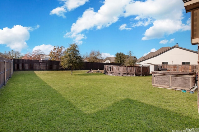 view of yard with a pool