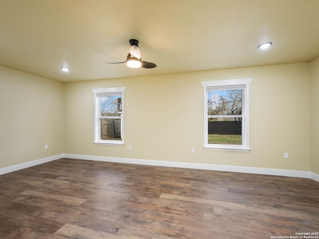 unfurnished room featuring dark hardwood / wood-style floors