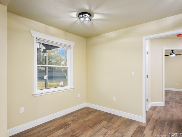 spare room featuring hardwood / wood-style flooring