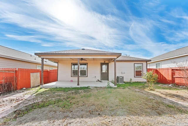 back of house with a lawn, central AC, ceiling fan, and a patio