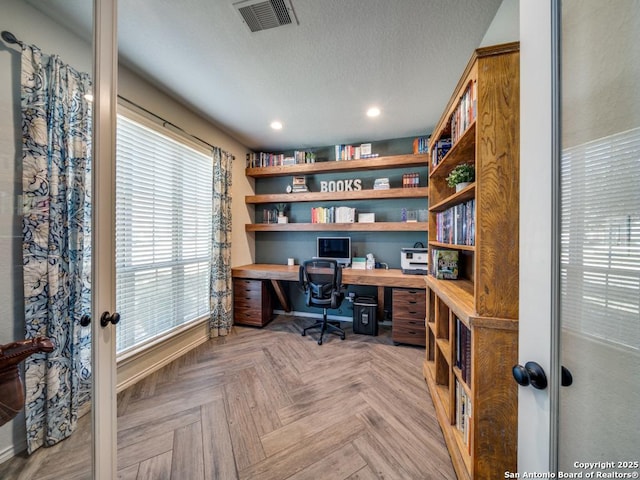 home office featuring light parquet flooring