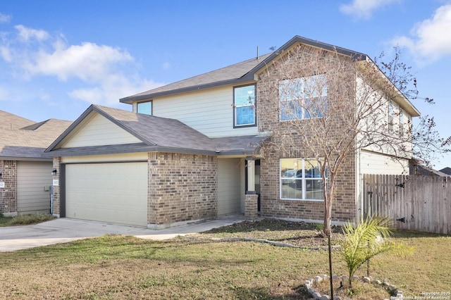 view of front of house with a garage and a front lawn