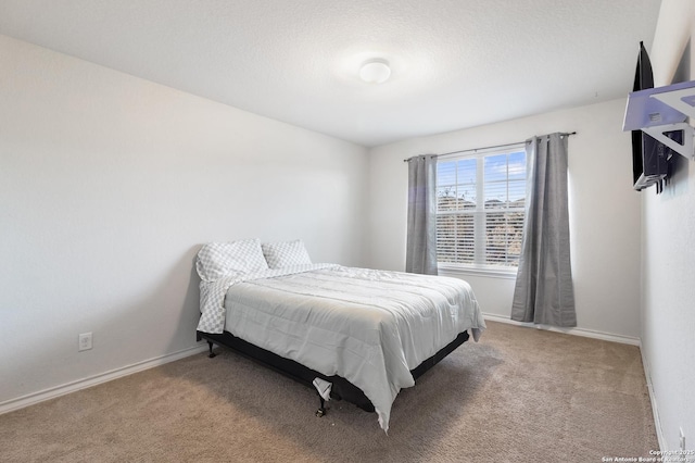 bedroom featuring light carpet