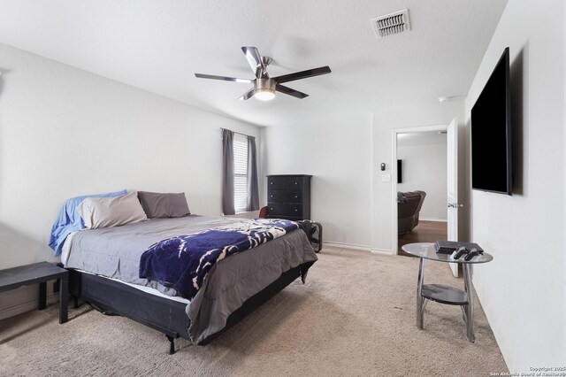 bedroom with carpet flooring and ceiling fan