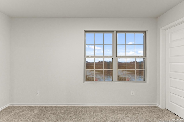 unfurnished room with carpet floors