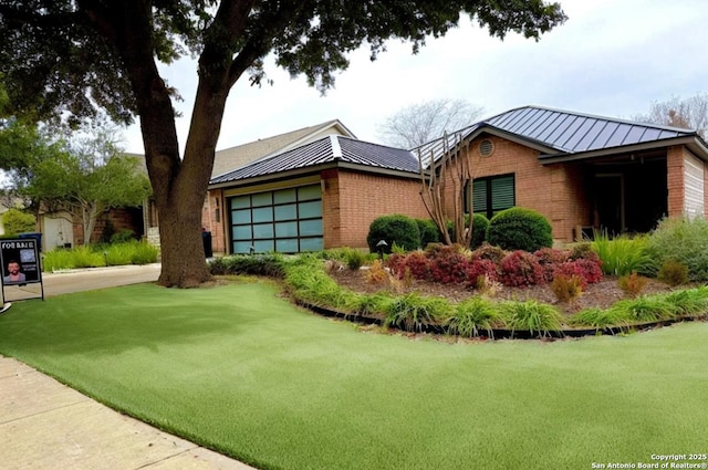 view of home's exterior featuring a yard and a garage