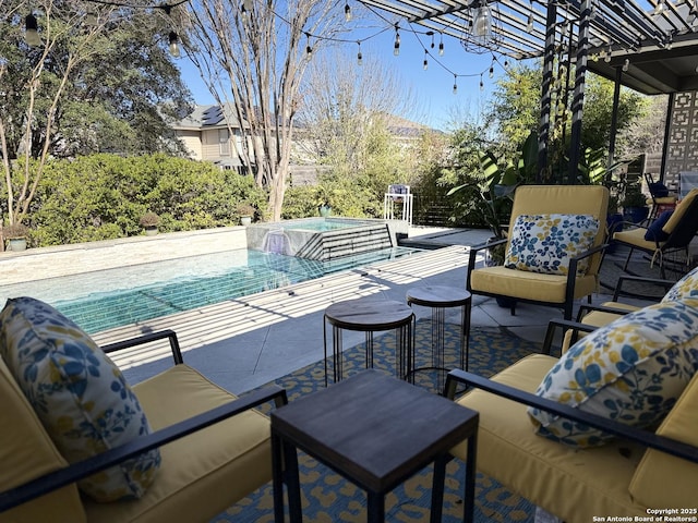 view of swimming pool with a jacuzzi and a patio area