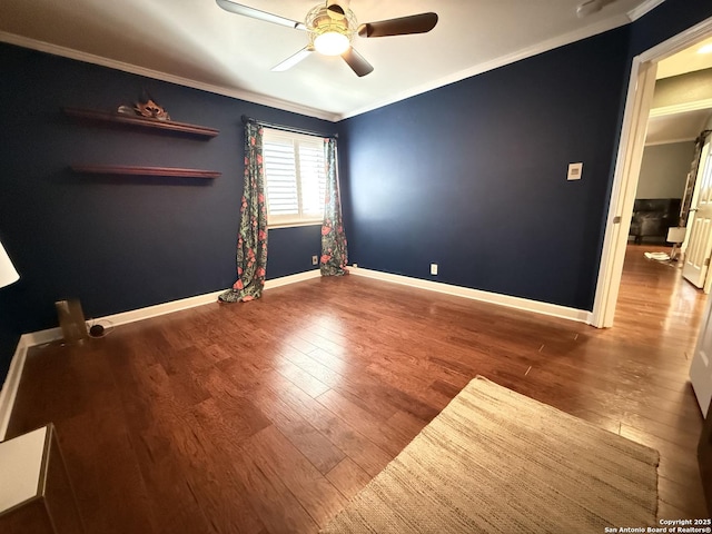 spare room featuring crown molding, hardwood / wood-style floors, and ceiling fan