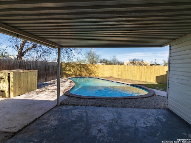 view of pool featuring a patio area