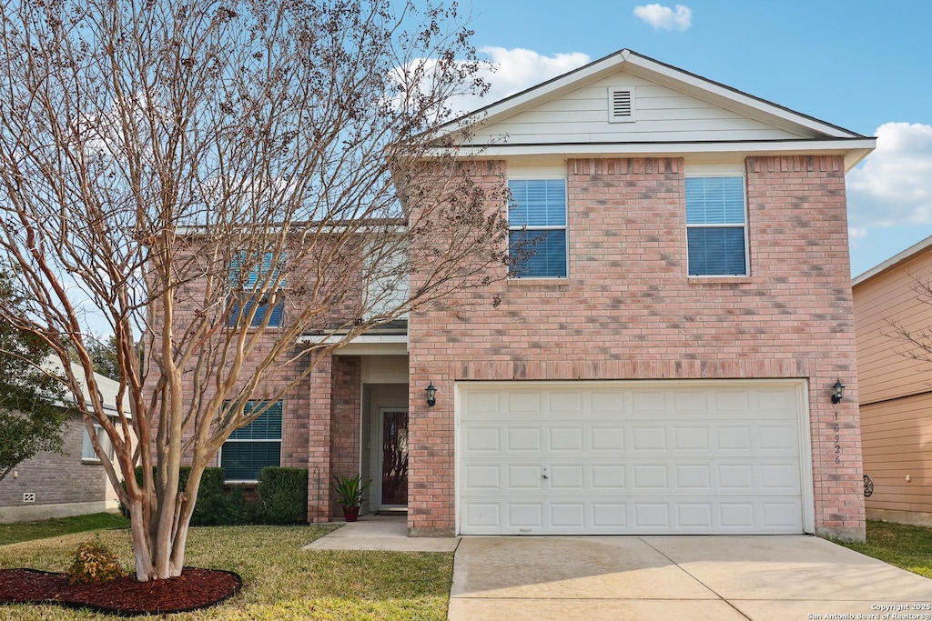 front of property with a garage