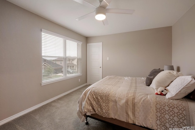 bedroom featuring carpet flooring, ceiling fan, and baseboards